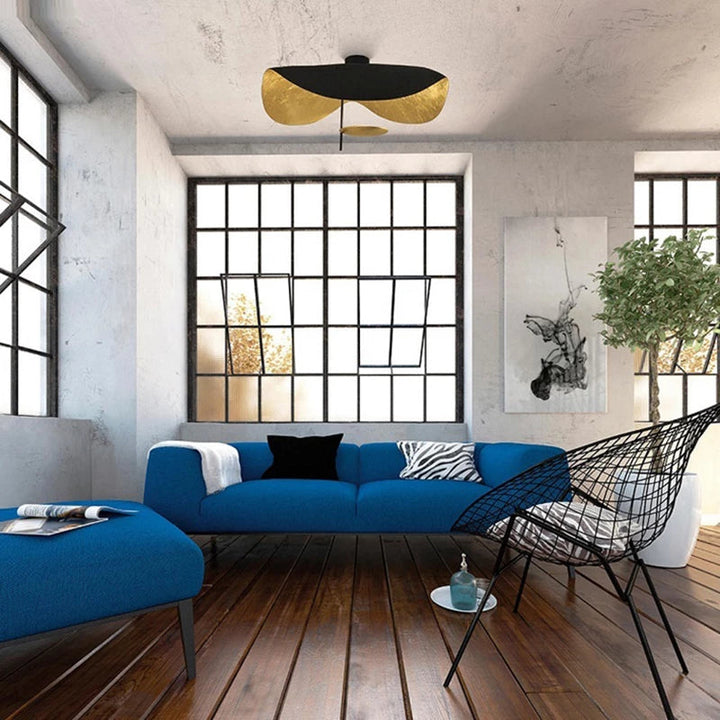 White Vellburn leaf design ceiling light, sculptural pendant fixture, enhances modern home decor.