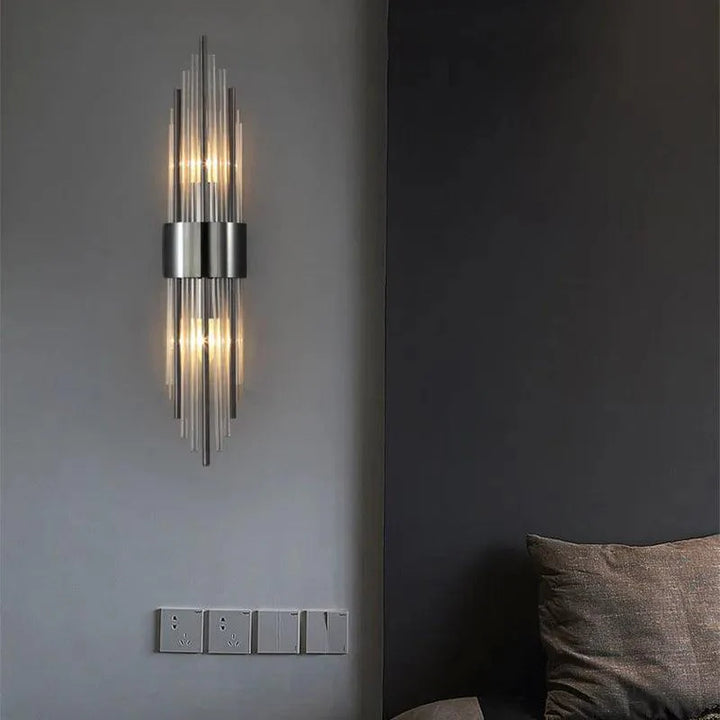 Black Veloria crystal lamp, a contemporary LED wall light enhancing bedroom & living room ambiance.