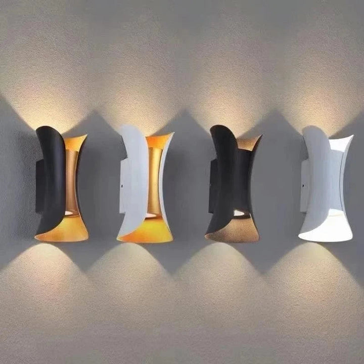 Contemporary black LED wall light, an energy-efficient solution for indoor and outdoor mood lighting.