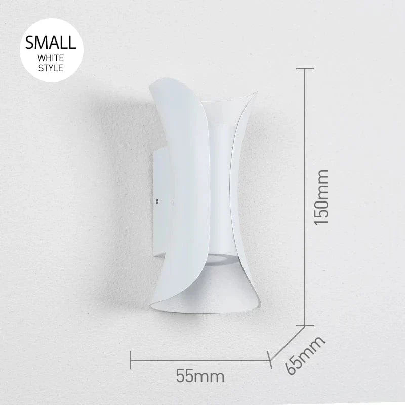 Indoor modern LED wall sconce, providing warm white ambient light for hallways and living rooms.