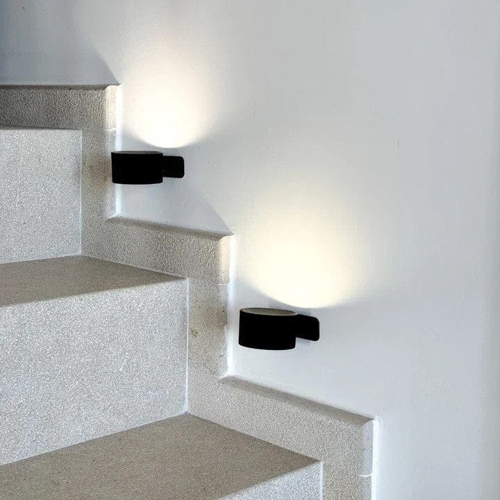 Accent LED wall light, rechargeable battery, cordless design for flexible modern decor.