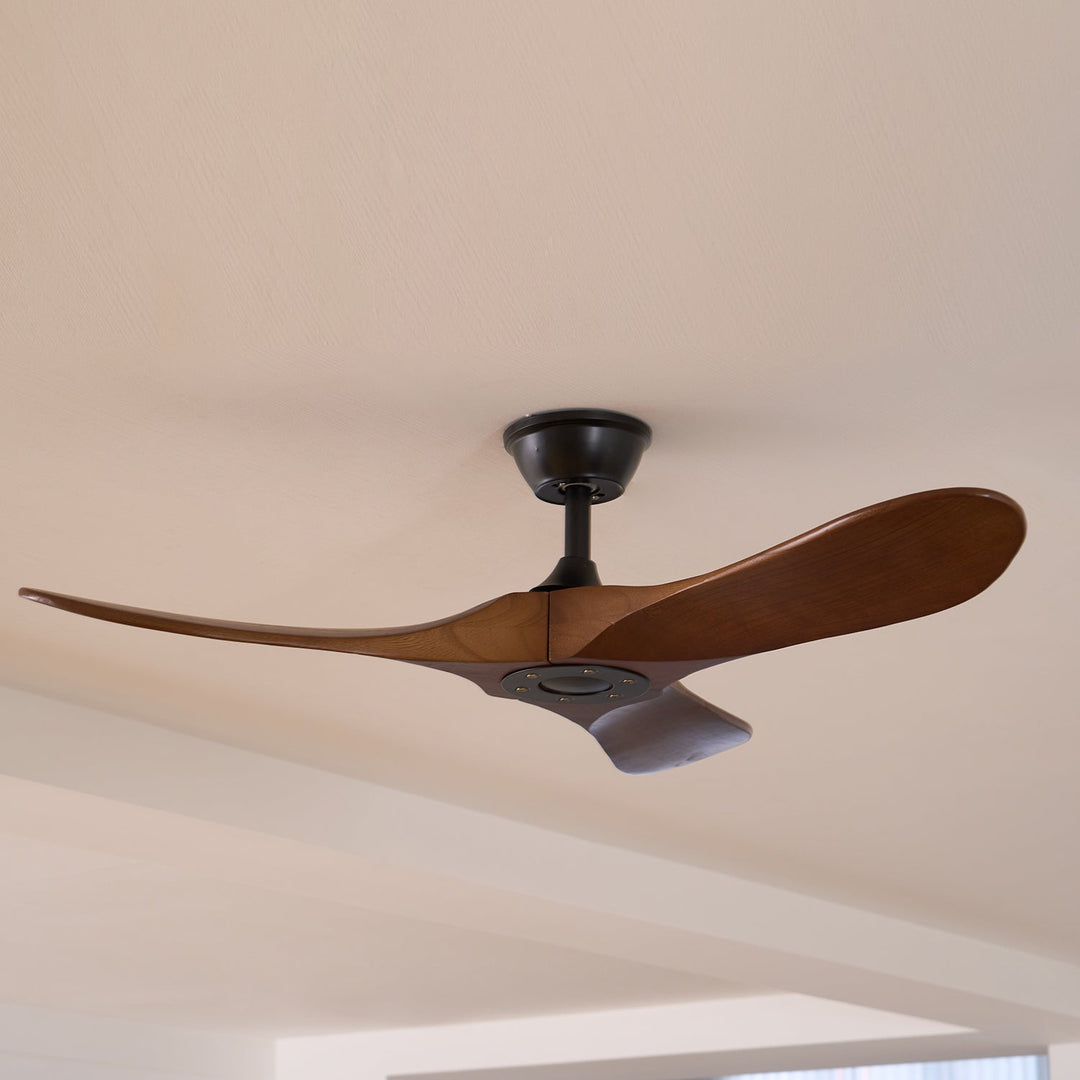 Quiet modern wooden ceiling fan with remote, bringing natural elegance and comfort indoors.