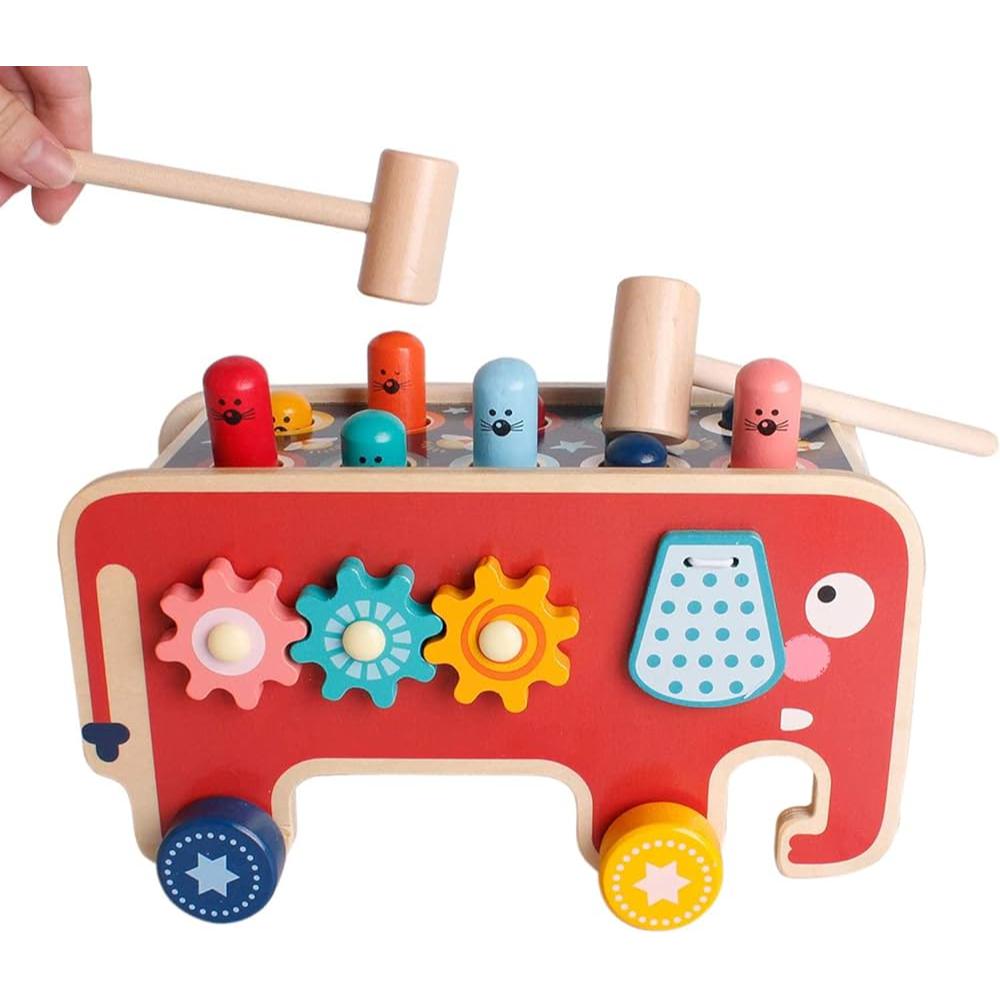 Toddler fine motor skill development with a classic wooden whack-a-mole toy