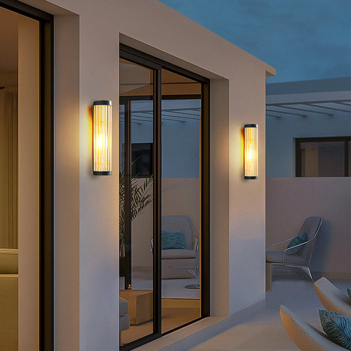 Modern Moorey LED outdoor wall light enhances entryway. Perfect for patio, balcony, and garden exterior decor.