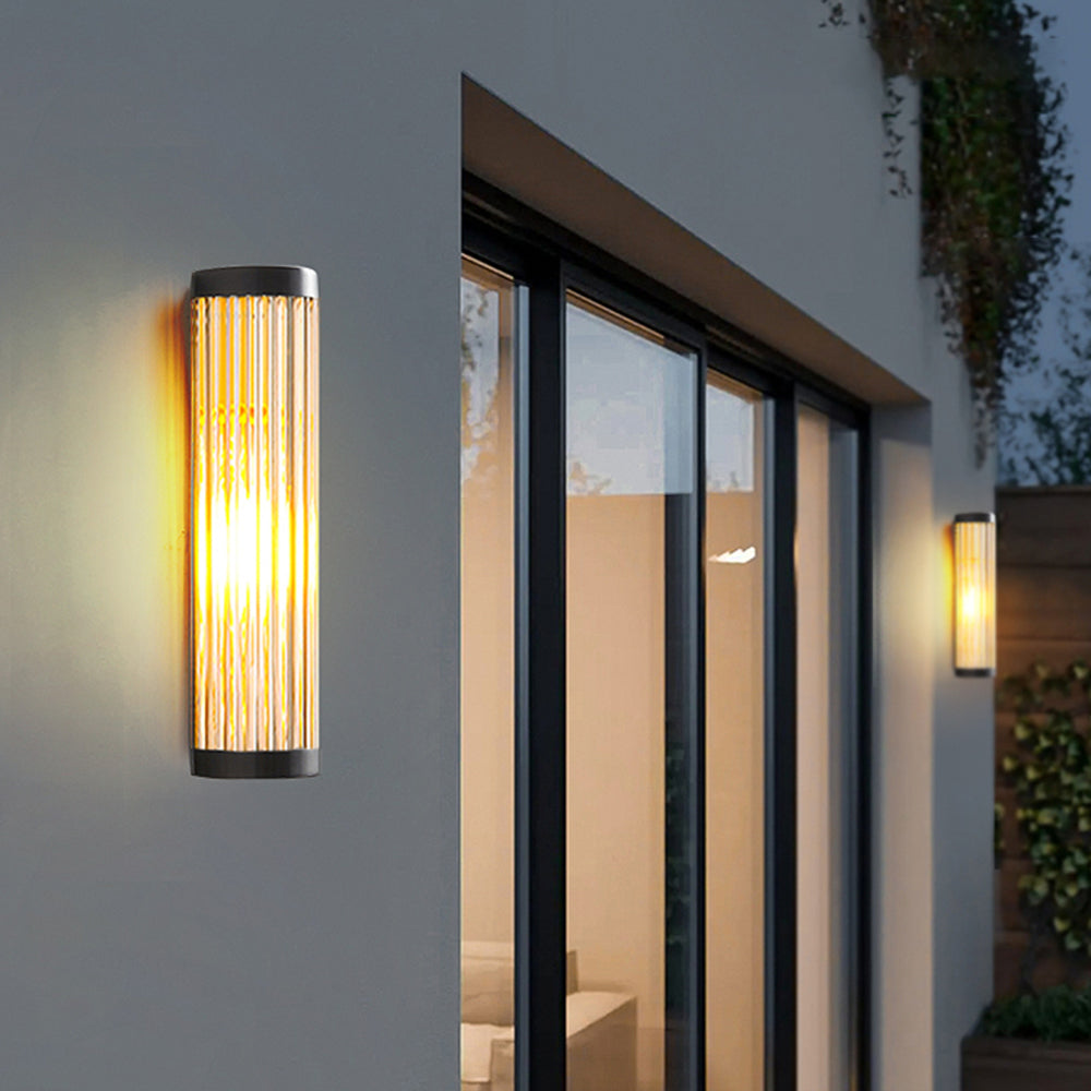 Sleek Moorey modern LED outdoor wall light. Weatherproof exterior decor for garden, patio, balcony, entryway.