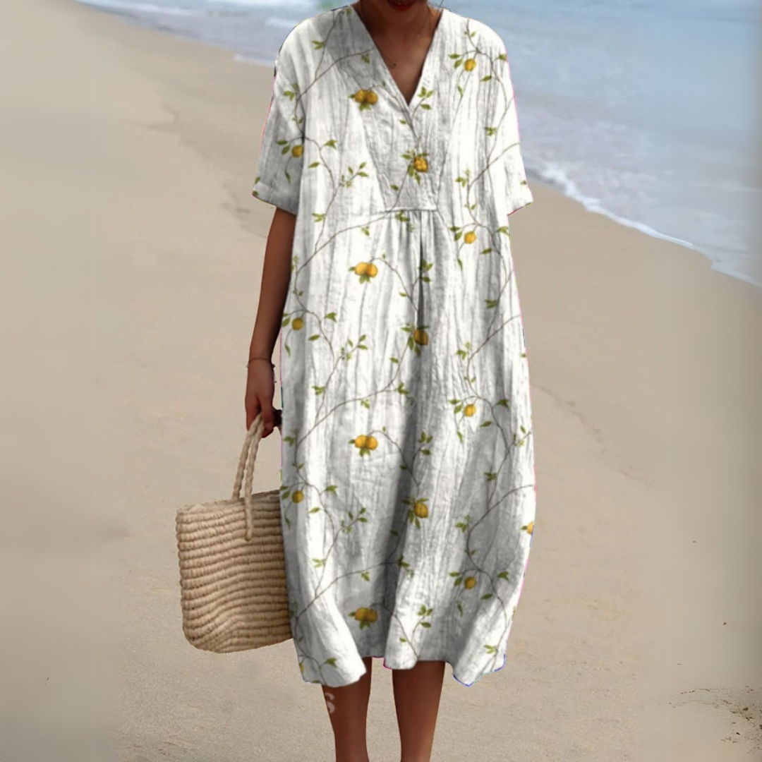 Multicolour V-neck maxi dress for women, offering an elegant and casual summer look.
