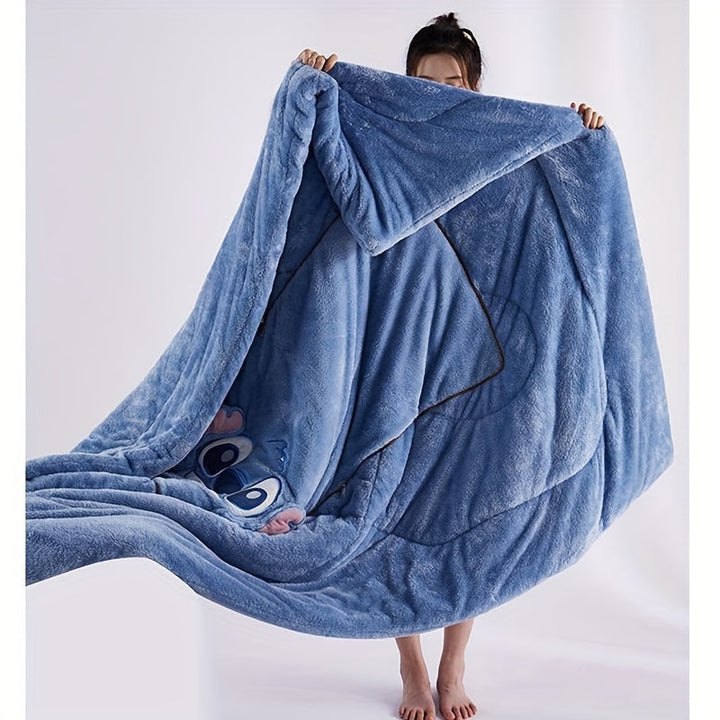 Soft plush blue Stitch alien character cushion transforms into a cozy comfort blanket, great for naps or travel.