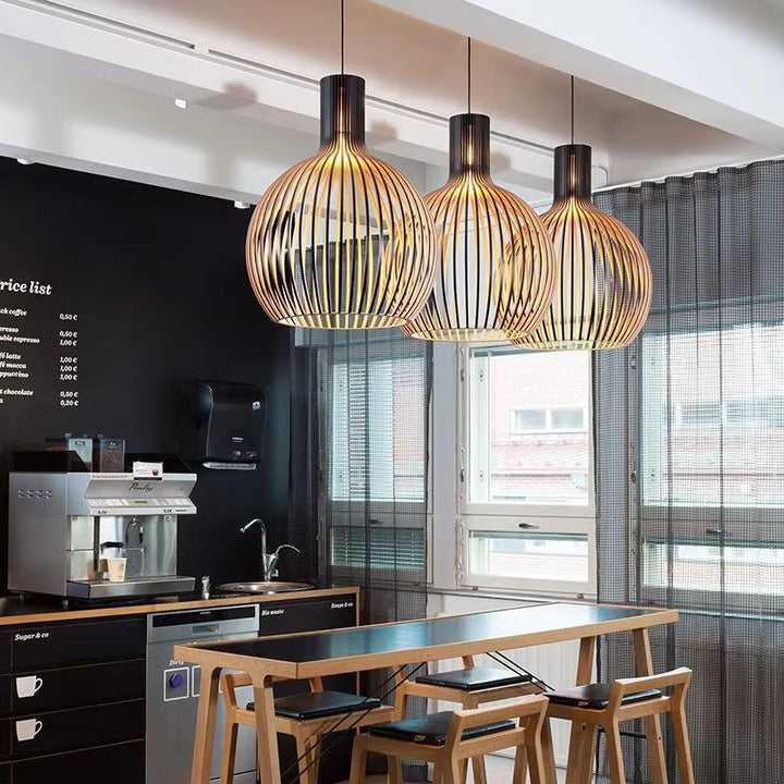 Handcrafted wooden sphere pendant lamp, Natura Orb model, for ambient home lighting.