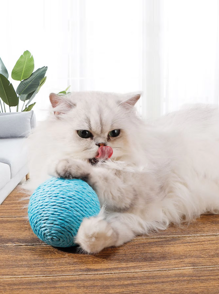 Natural sisal scratching ball, an enriching, durable pet toy designed for cats' active play & claw health.