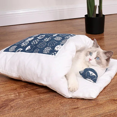 Navy blue ComfyCave plush pet bed, perfect for cats and small dogs needing a cozy, calming spot.