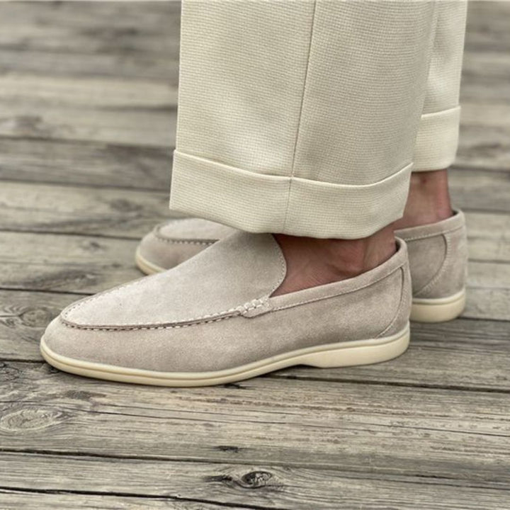 Black men's comfort loafers, smart casual slip-on shoes with stitched detail.