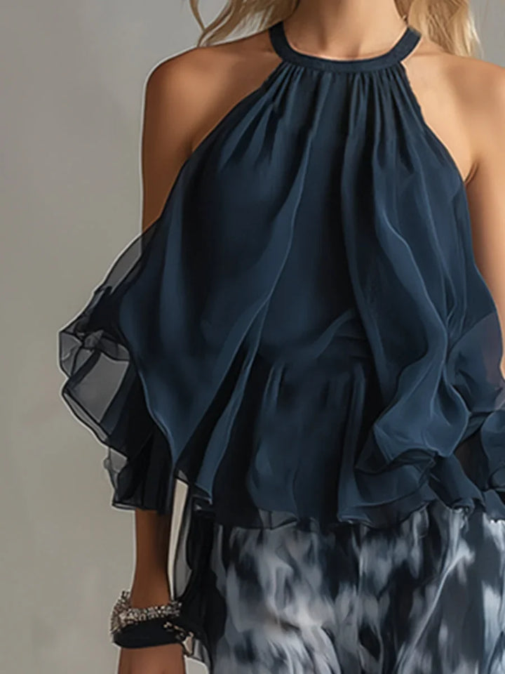 Elegant women's halter neck tie-dye top and matching wide leg pants set in navy blue for chic wear.