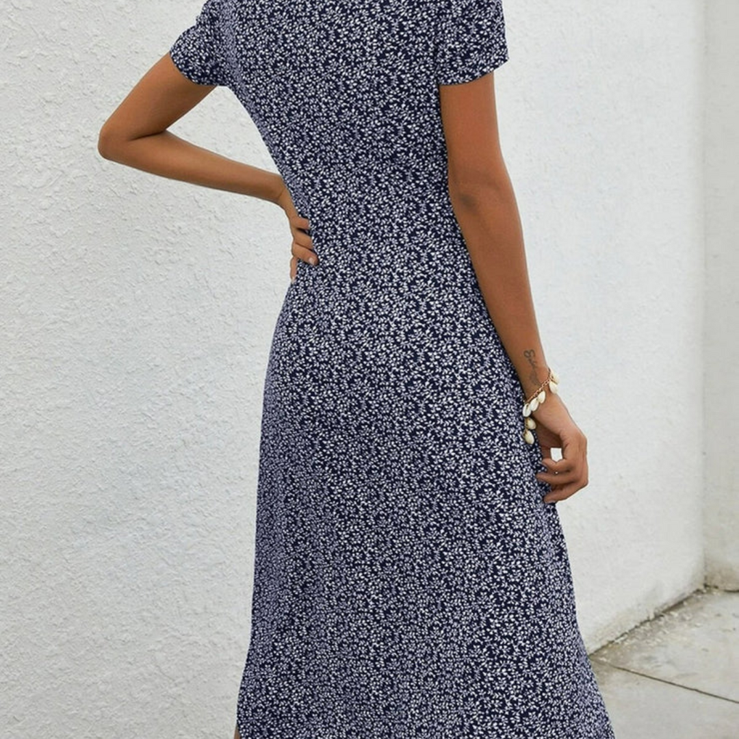 Navy blue women's lightweight sleeveless midi dress, perfect for summer casual wear or elegant vacation style.