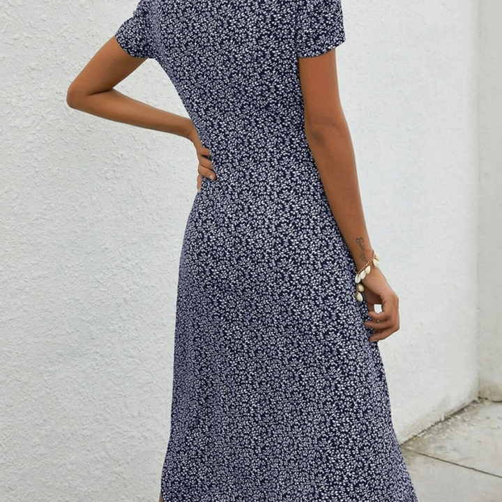 Navy blue women's lightweight sleeveless midi dress, perfect for summer casual wear or elegant vacation style.
