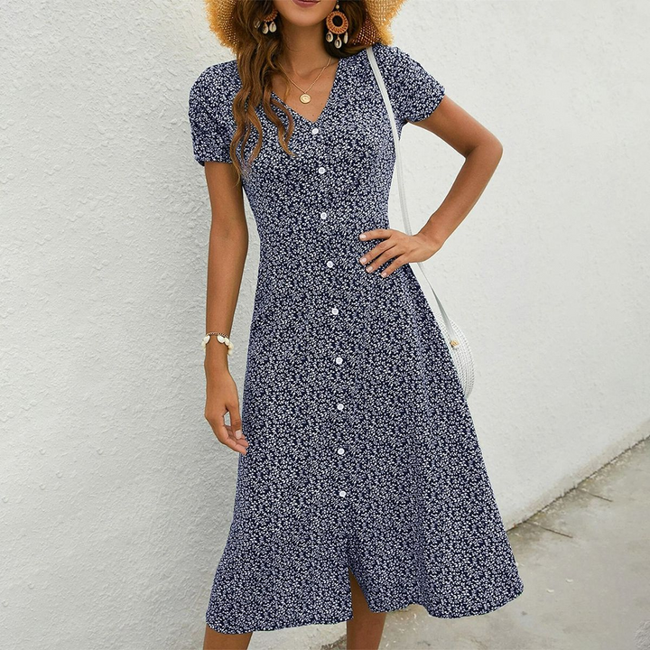 Versatile women's midi dress in navy, ideal for everyday comfort, casual outings, or stylish summer vacations.