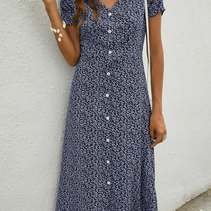 Airy, comfortable navy midi dress for women, featuring a sleeveless design for effortless summer fashion.