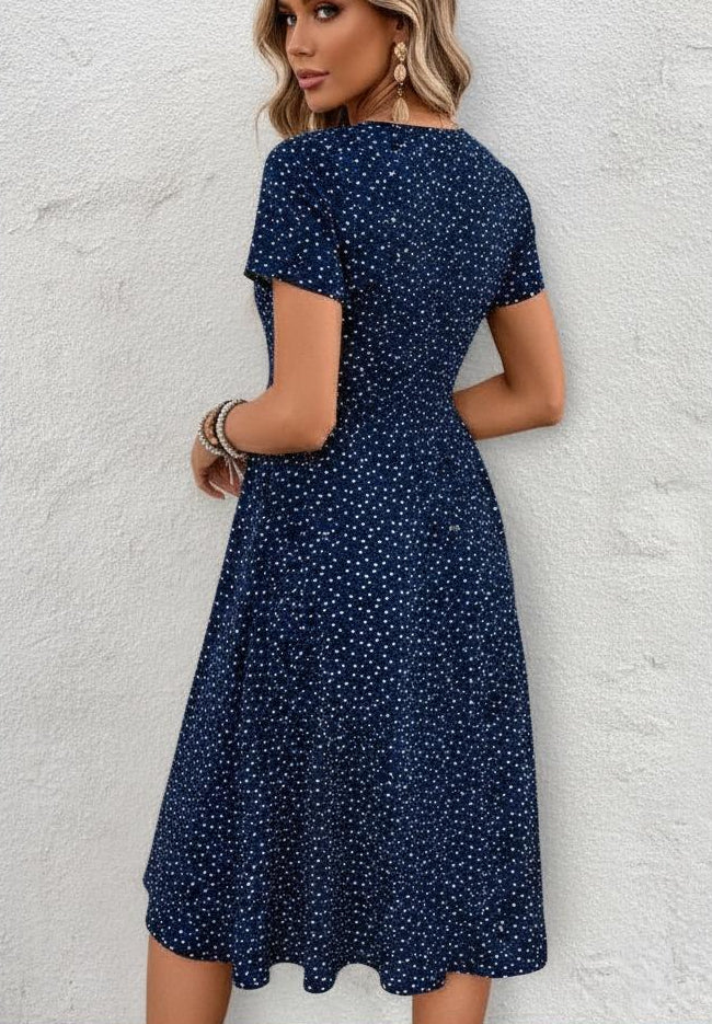Chic navy polka dot button-front midi dress, perfect for women's fashion.
