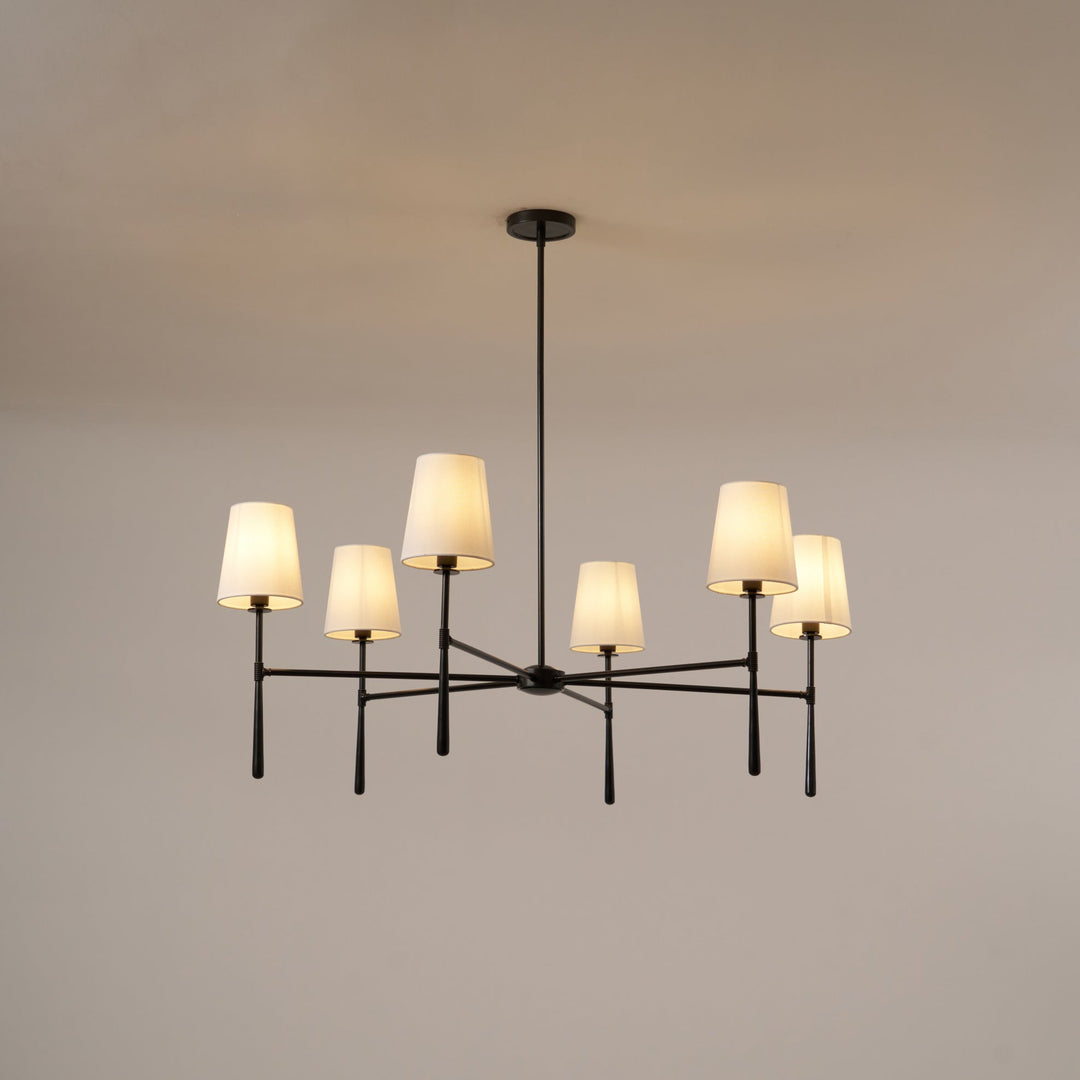 Nevell mid-century modern brass chandelier; a stylish centerpiece for your home.
