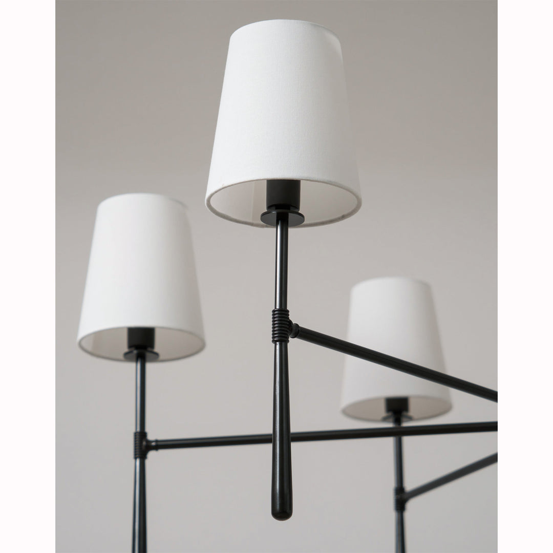 Adjustable Nevell chandelier; sleek black finish, adaptable for dining or living rooms.