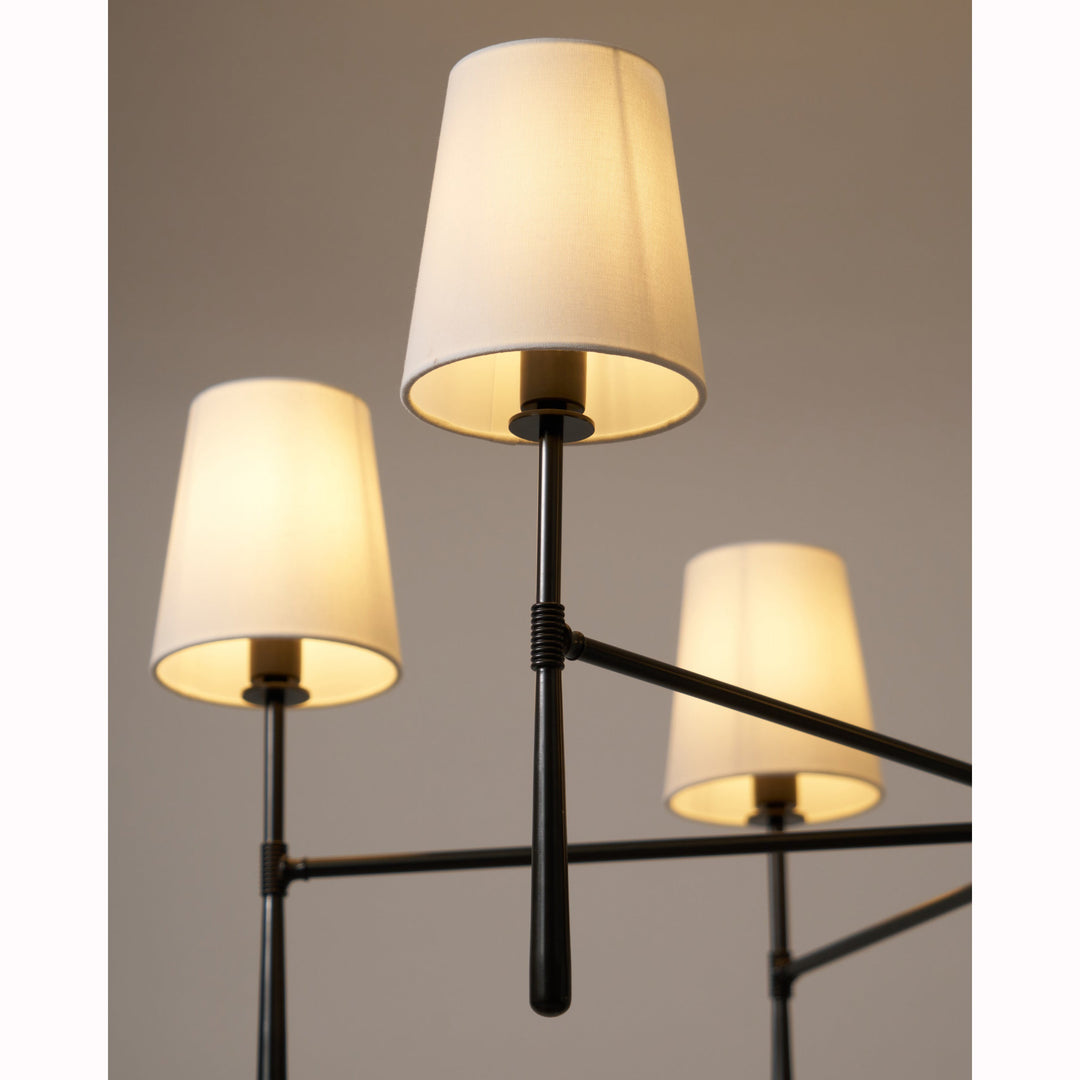Mid-century modern Nevell brass chandelier; unique lighting for distinctive interiors.