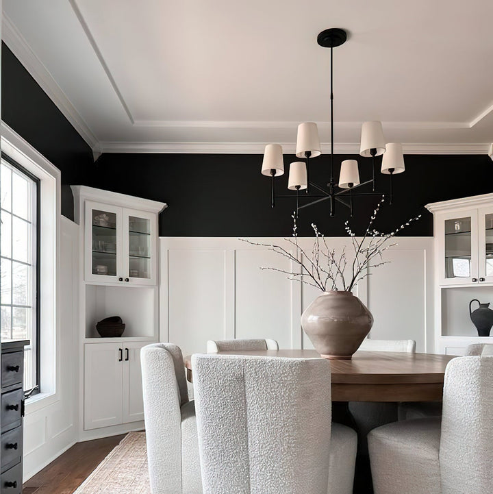 Nevell modern chandelier; striking brass finish, ideal for contemporary spaces.