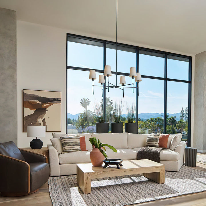 Statement Nevell chandelier; bold black design, mid-century inspired for living rooms.