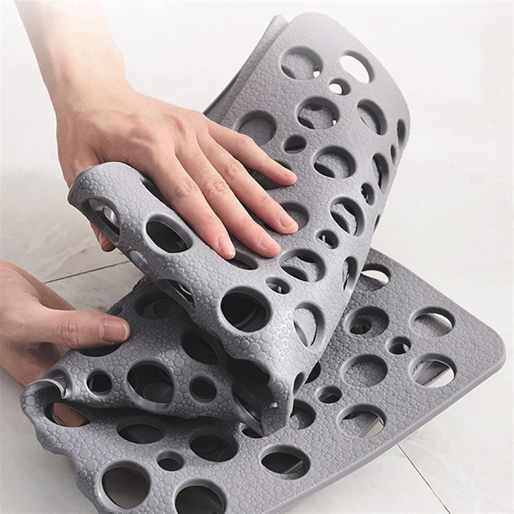 Anti-slip bath mat ensures maximum safety and hygiene in showers and bathtubs. Home comfort.