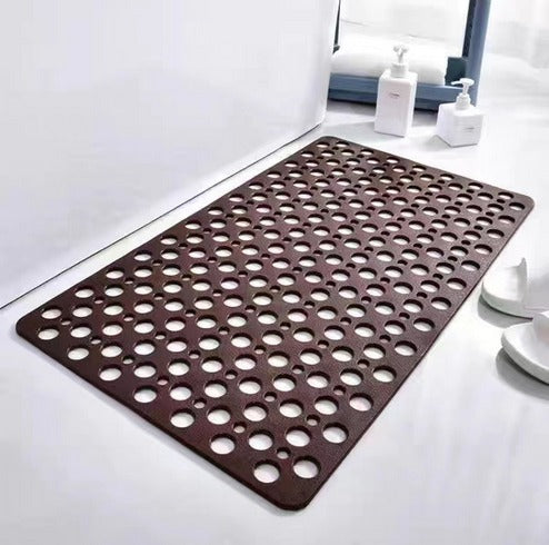 Textured anti-slip shower mat for superior traction, ensuring ultimate bathroom safety.