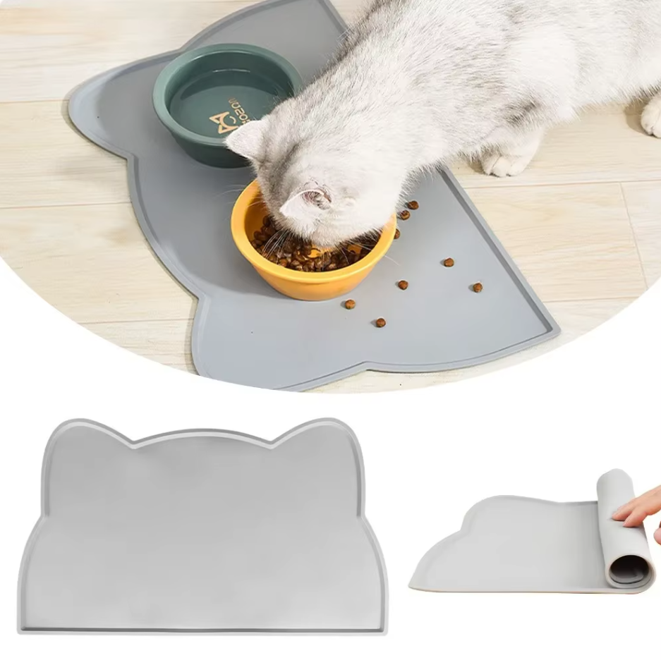 Non-slip silicone feeding mat for cats, prevents spills & keeps mealtime tidy.
