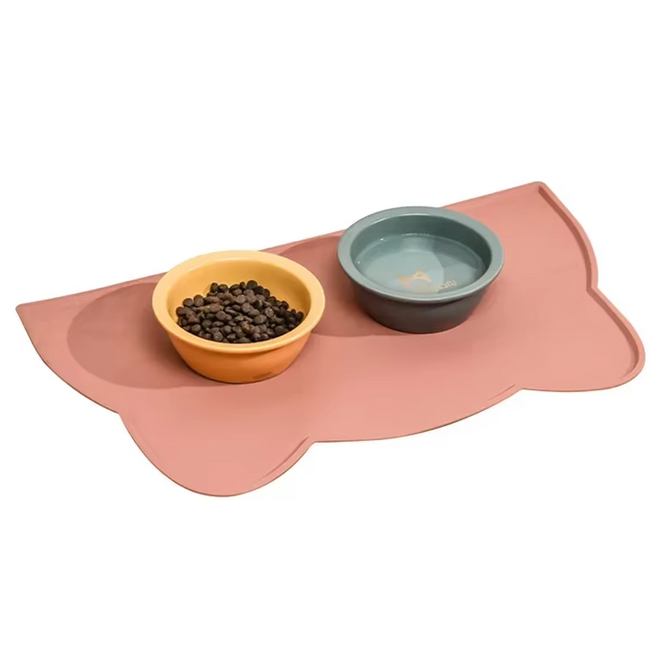 Convenient non-slip silicone mat for cat food bowls, making cleanup a breeze. Pet owner must-have.