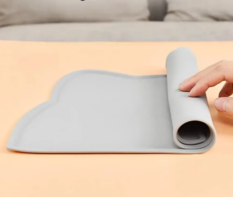 Durable silicone pet mat for cats. Non-slip design keeps bowls in place, easy to clean.