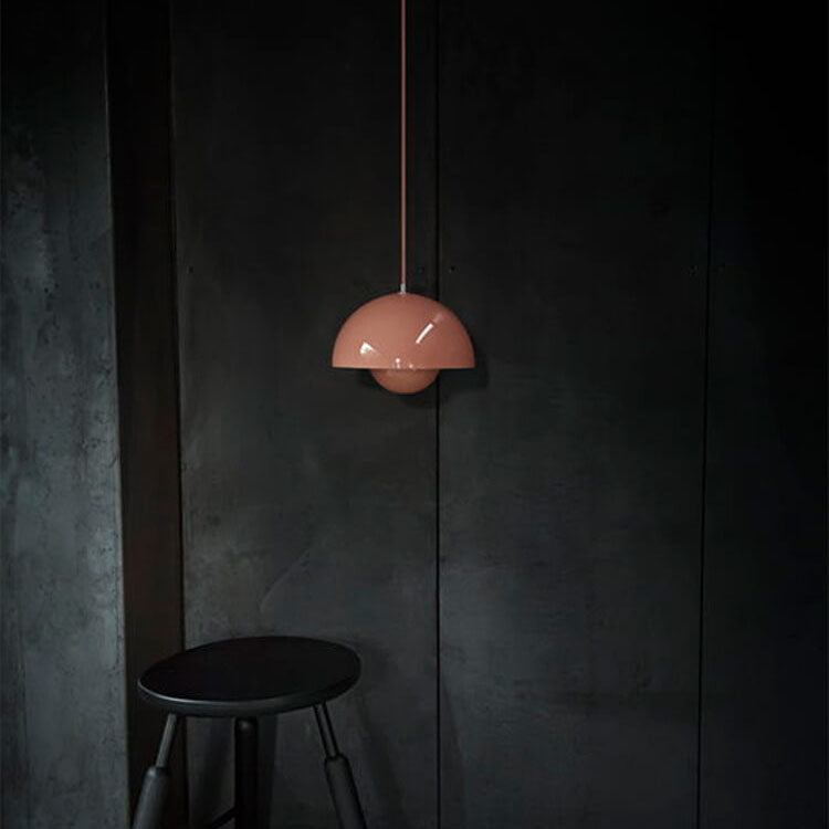 Dining area enhanced by a Nordic Dome Pendant Lamp. Modern and minimalist lighting for contemporary spaces.