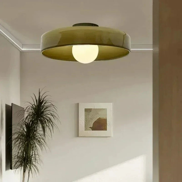 Nordic glass ceiling lamp providing modern ambient lighting; perfect Scandinavian design for home decor.