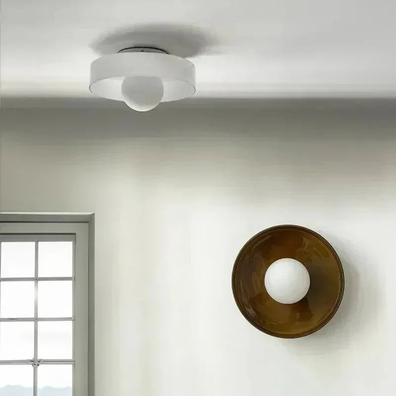 Modern glass ceiling lamp with elegant Nordic design, ideal for atmospheric lighting in any interior.
