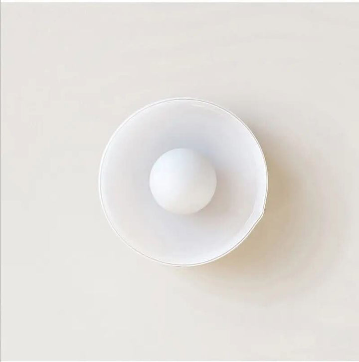 Sleek glass ceiling lamp, a Scandinavian-inspired fixture for stylish and ambient home lighting.