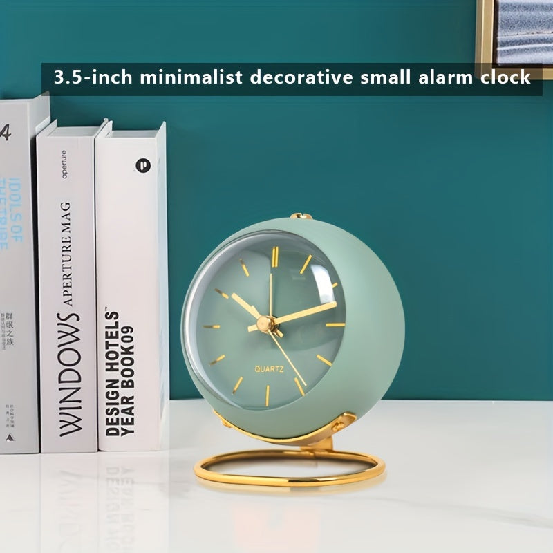 Battery operated pink Nordic clock with luminous hands and stylish metal frame