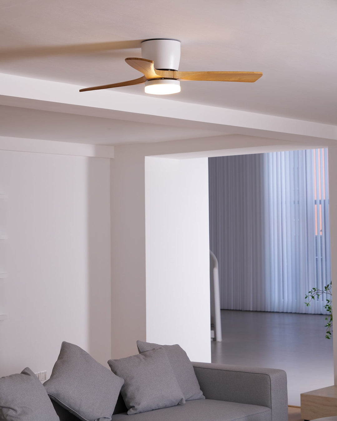 Minimalist wooden ceiling fan, Nordic aesthetic, with LED light & remote for clean lines.