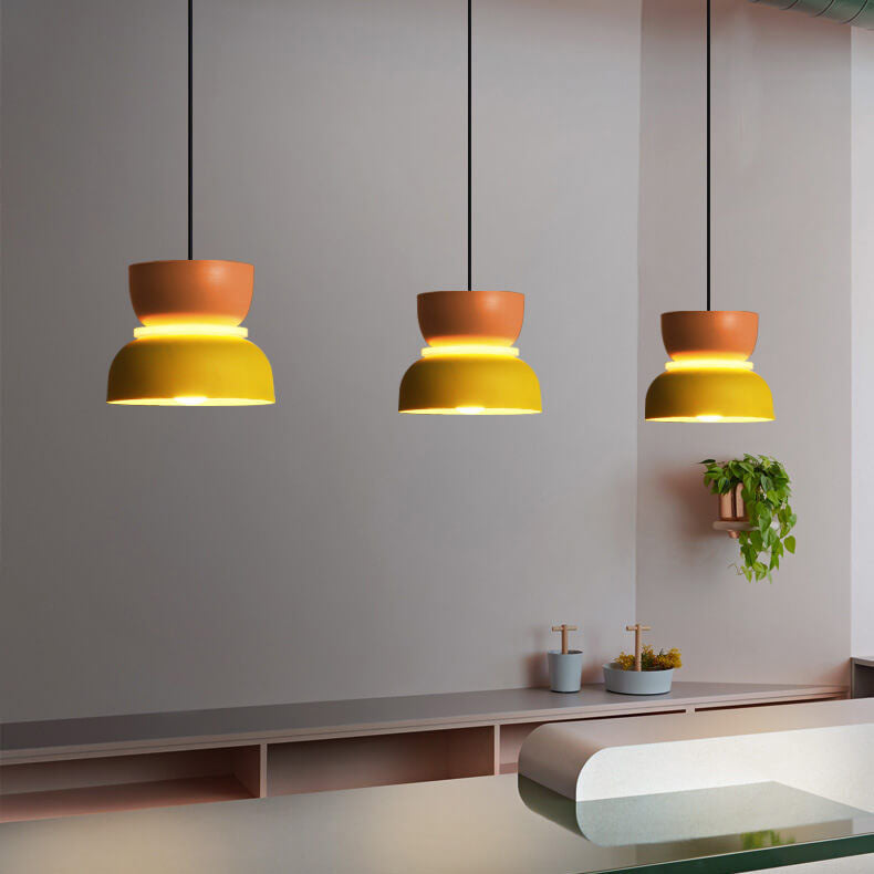 Modern Nordmere pendant light with dual tone finish. Elegant dome ceiling lamp for entryways.