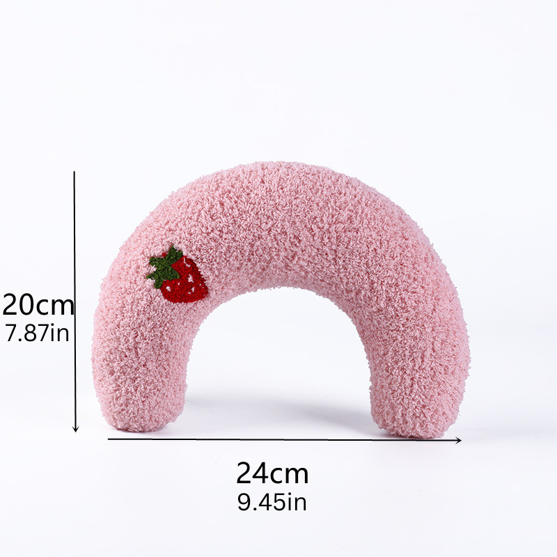 Plush NuzzleNap pillow offering dog neck support and cat comfort.