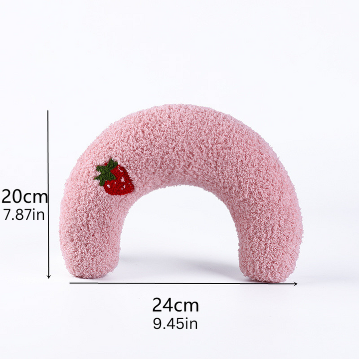 Plush NuzzleNap pillow offering dog neck support and cat comfort.