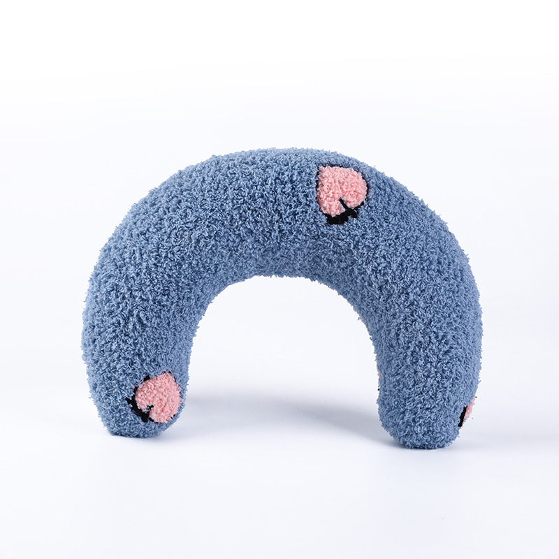 Ergonomic NuzzleNap pillow ensuring comfortable sleep for pets.