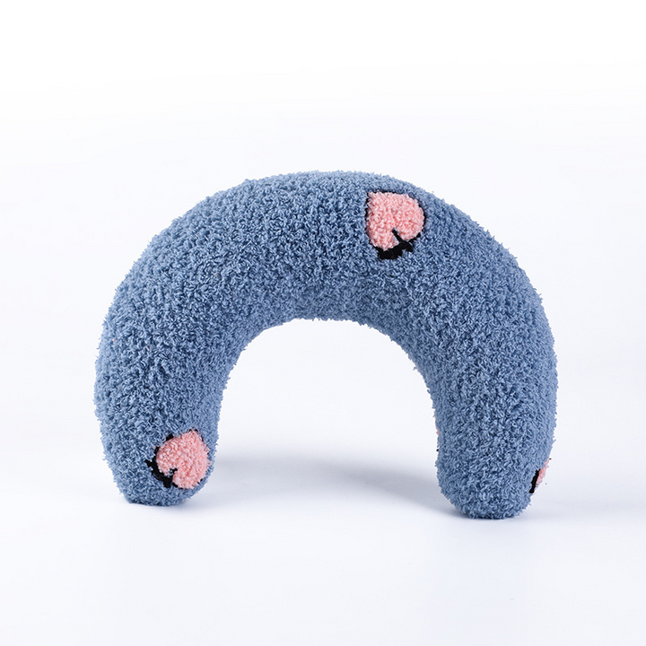 Ergonomic NuzzleNap pillow ensuring comfortable sleep for pets.