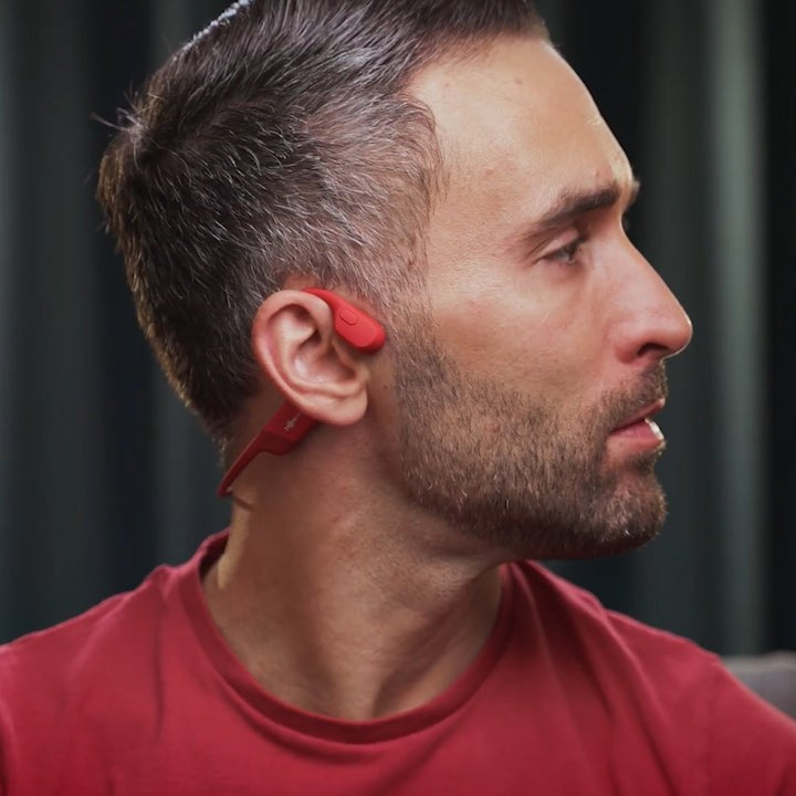 Open-ear wireless headphones for safe audio & situational awareness during active workouts.