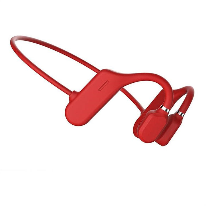 Person biking safely with open-ear wireless headphones, enjoying music while aware of traffic.