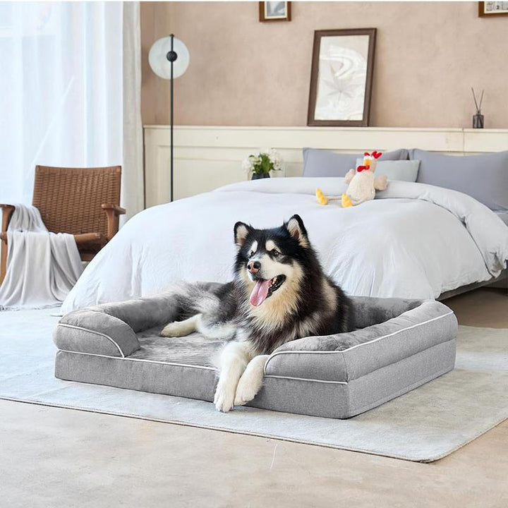 Lightweight & portable orthopedic dog bed for small dogs, offering memory foam joint support & pet comfort.