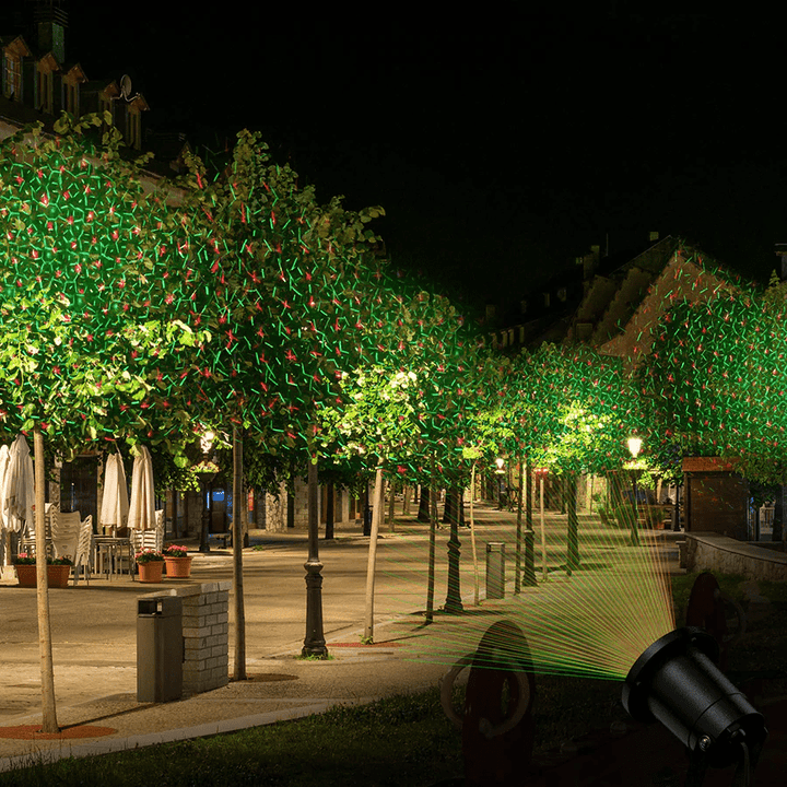 Outdoor Christmas laser light projector with red & green lights, perfect for festive holiday garden decor.