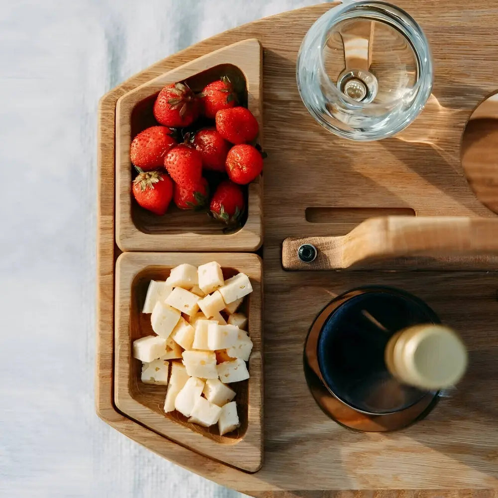Stylish wooden foldable table for outdoor use. Perfect for holding drinks & snacks during picnics or beach outings.