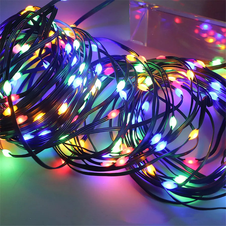 Elegant warm white LED string lights enhancing patio and garden ambiance, perfect for evening gatherings.