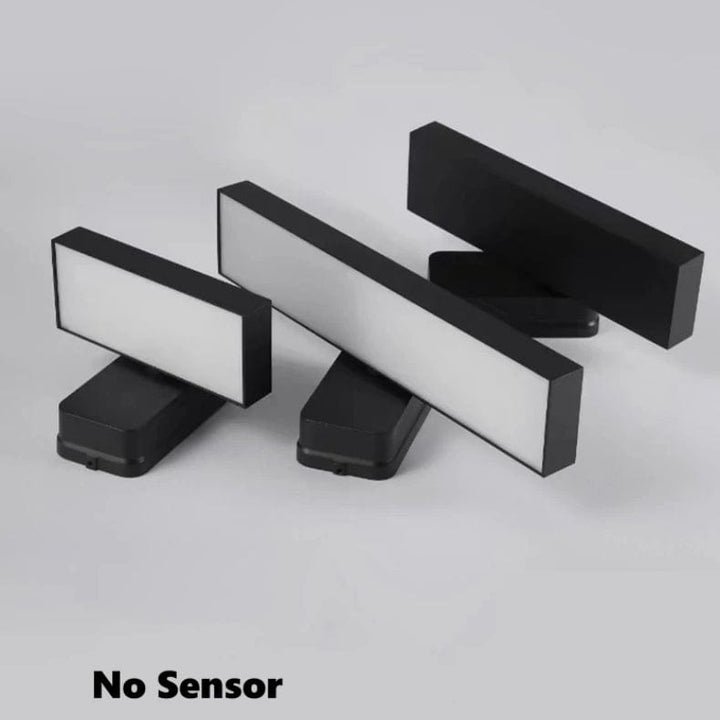Outdoor motion sensor wall light, weatherproof, for garden & porch security.