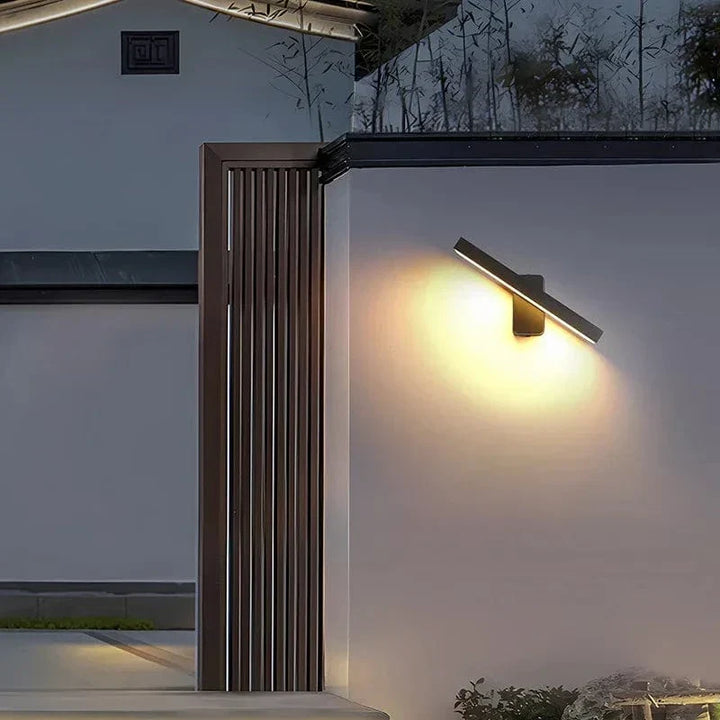 Adjustable outdoor security wall lamp, motion activated, warm white LED, modern.
